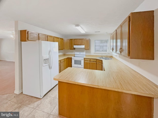 6502 Elk Ct, Waldorf, MD 20603 - kitchen with white appliances, light countertops, a sink, a peninsula, and under cabinet range hood