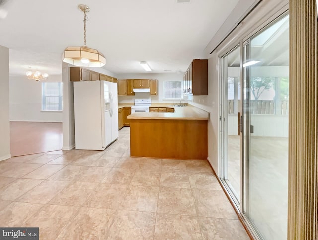 6502 Elk Ct, Waldorf, MD 20603 - kitchen with white appliances, a sink, light countertops, and healthy amount of natural light