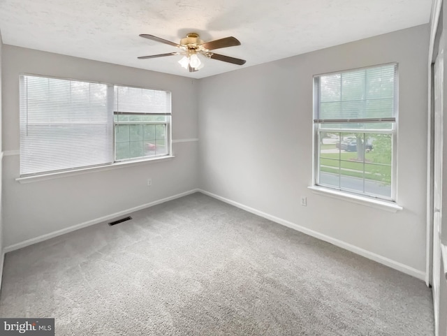 6502 Elk Ct, Waldorf, MD 20603 - spare room featuring a ceiling fan, baseboards, and carpet floors