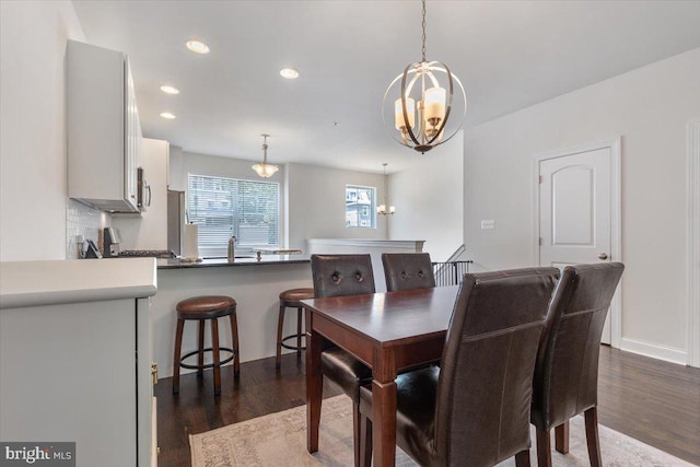 605 Apple St, Conshohocken, PA 19428 - dining space featuring a chandelier, dark wood-style flooring, and recessed lighting