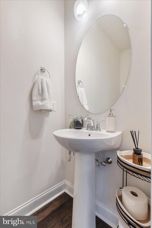 605 Apple St, Conshohocken, PA 19428 - bathroom with wood finished floors and baseboards