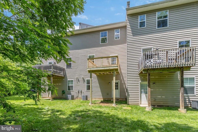 605 Apple St, Conshohocken, PA 19428 - rear view of property with a lawn and central AC unit