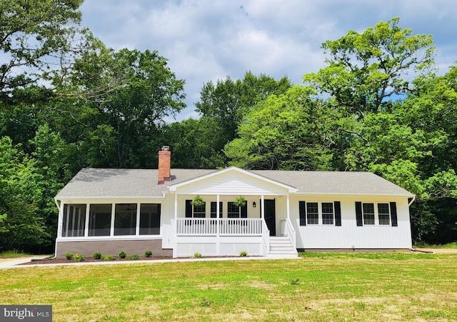 7845 Fleming Coates Place, La Plata, MD 20646 - ranch-style home featuring a porch, a front lawn, and a chimney