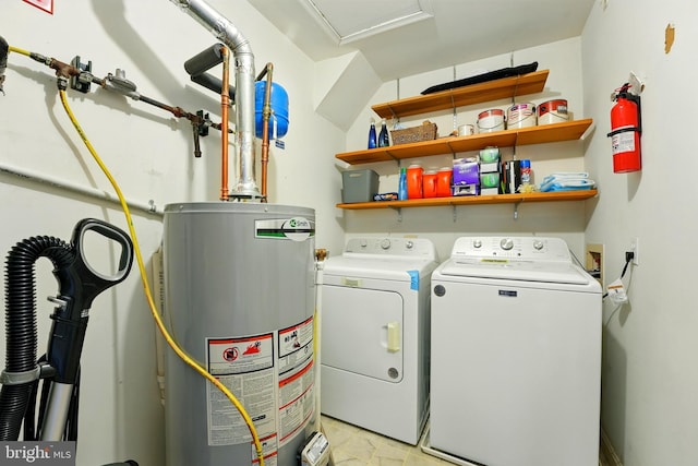 113 Timberlake Ter Unit 12, Stephens City, VA 22655 - laundry room featuring gas water heater and washing machine and clothes dryer
