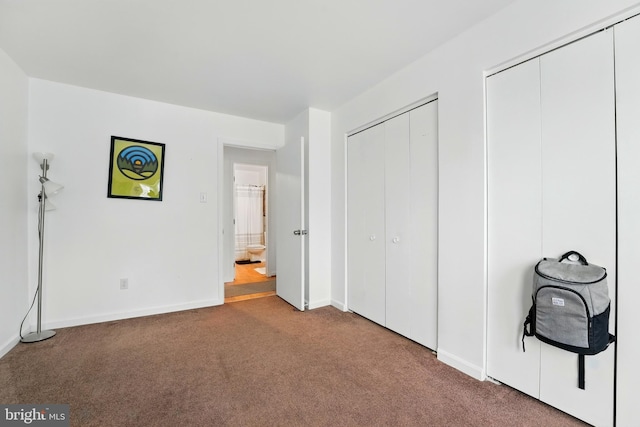 113 Timberlake Ter Unit 12, Stephens City, VA 22655 - unfurnished bedroom with carpet flooring, two closets, and baseboards