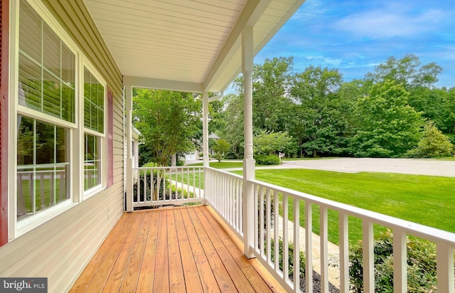 21143 Catnip Ct, Leonardtown, MD 20650 - wooden porch featuring a yard and view of wooded area
