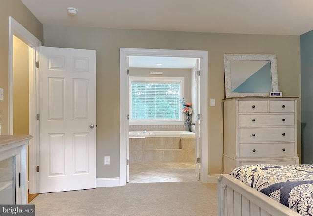 21143 Catnip Ct, Leonardtown, MD 20650 - bedroom with light colored carpet, baseboards, ensuite bathroom, and light tile patterned floors