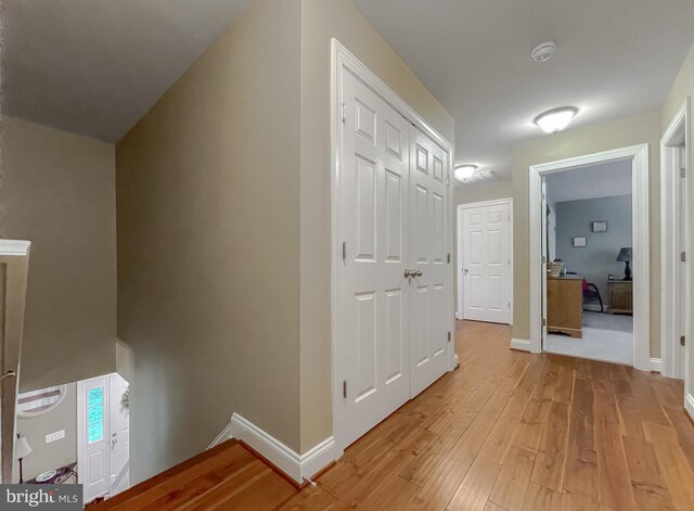 21143 Catnip Ct, Leonardtown, MD 20650 - hallway featuring light wood-style flooring and baseboards