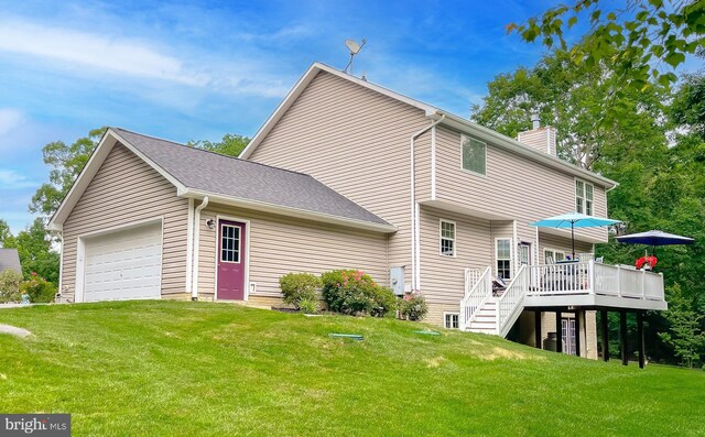 21143 Catnip Ct, Leonardtown, MD 20650 - rear view of house featuring a chimney, a yard, a deck, and a garage