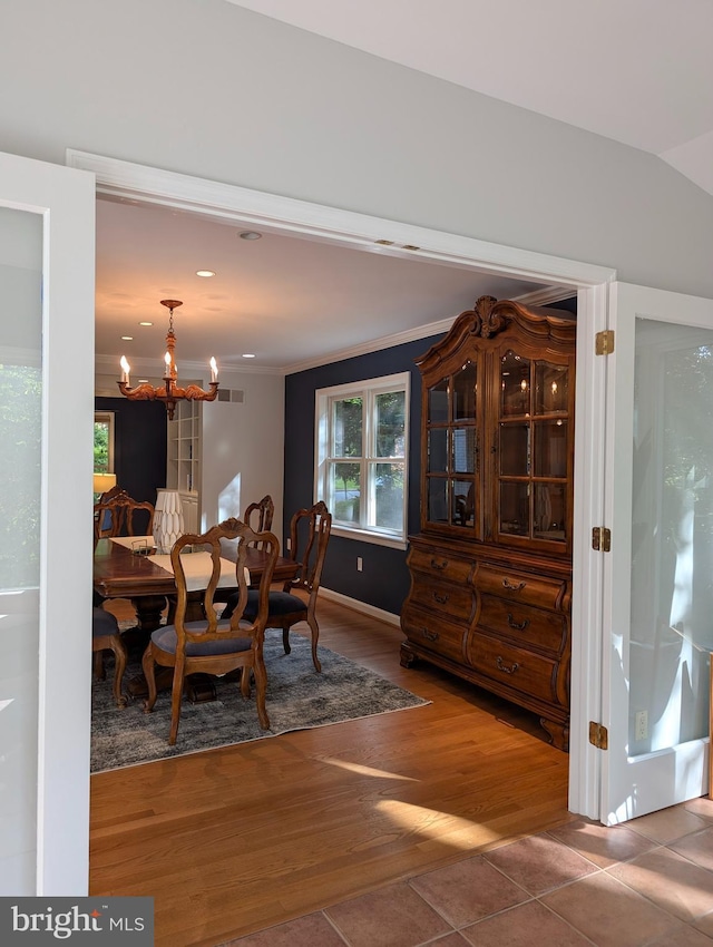 9510 Clement Rd, Silver Spring, MD 20910 - dining area featuring a chandelier, ornamental molding, wood finished floors, and recessed lighting