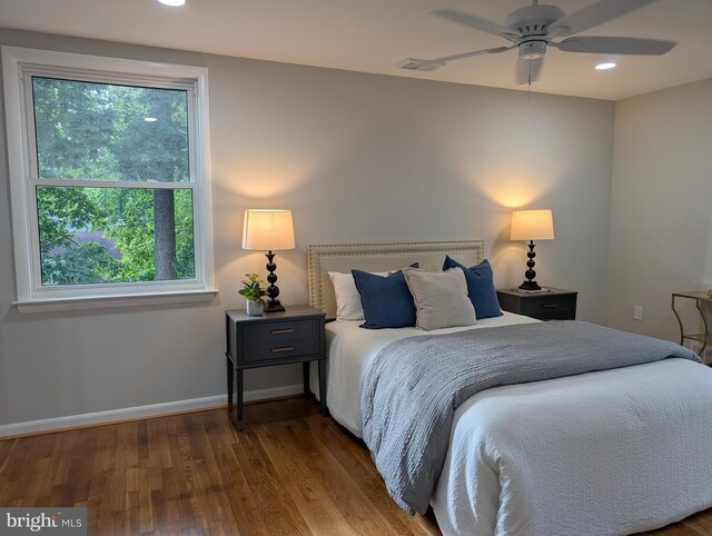 9510 Clement Rd, Silver Spring, MD 20910 - bedroom with wood finished floors, baseboards, and recessed lighting