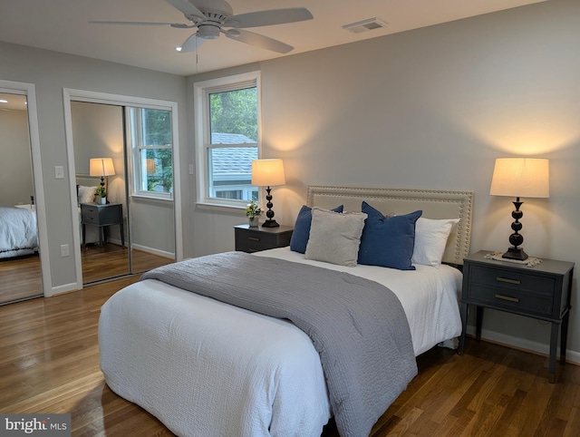 9510 Clement Rd, Silver Spring, MD 20910 - bedroom featuring wood finished floors, baseboards, a ceiling fan, and multiple closets