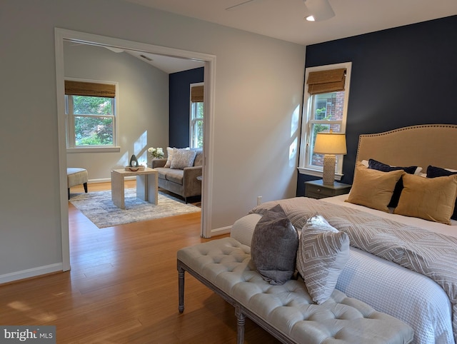 9510 Clement Rd, Silver Spring, MD 20910 - bedroom with wood finished floors, baseboards, and recessed lighting