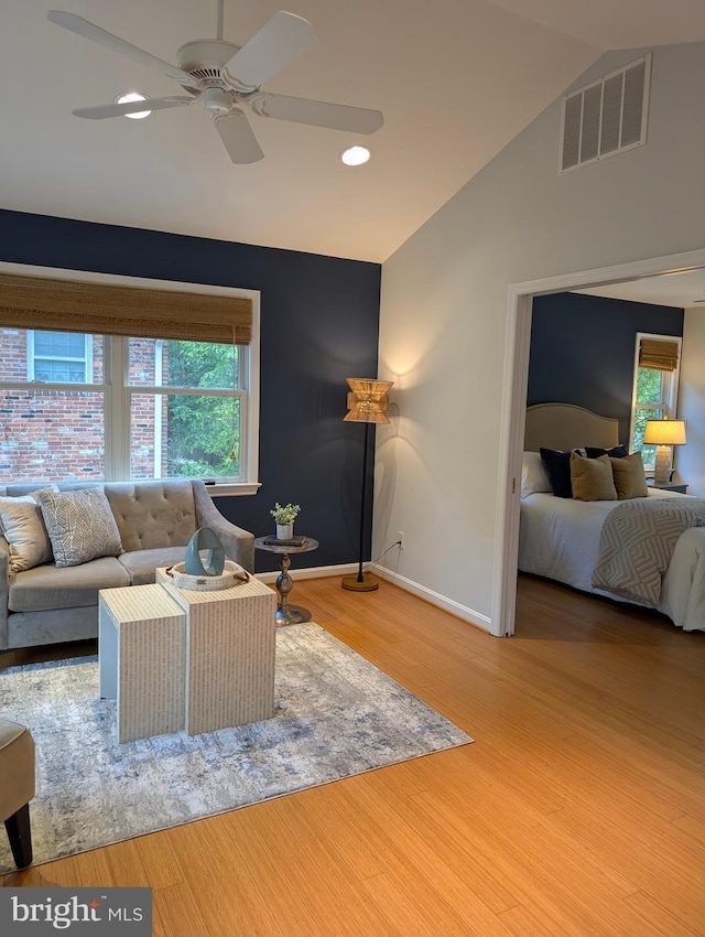 9510 Clement Rd, Silver Spring, MD 20910 - living room with lofted ceiling, baseboards, a ceiling fan, wood finished floors, and recessed lighting