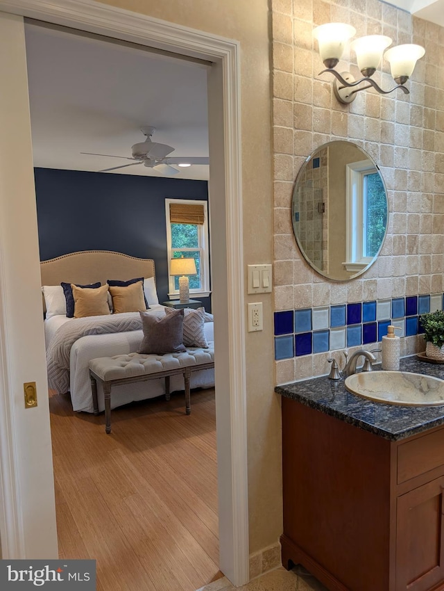 9510 Clement Rd, Silver Spring, MD 20910 - bathroom with ensuite bath, vanity, a chandelier, and ceiling fan