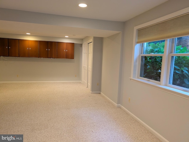 9510 Clement Rd, Silver Spring, MD 20910 - basement featuring recessed lighting, light colored carpet, and baseboards