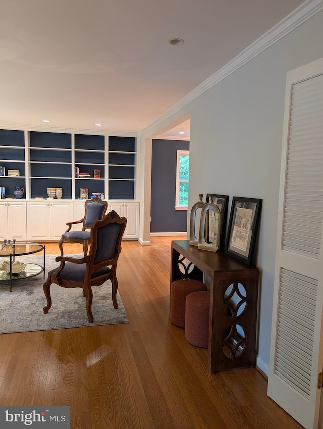 9510 Clement Rd, Silver Spring, MD 20910 - office space featuring ornamental molding, wood finished floors, baseboards, built in shelves, and recessed lighting