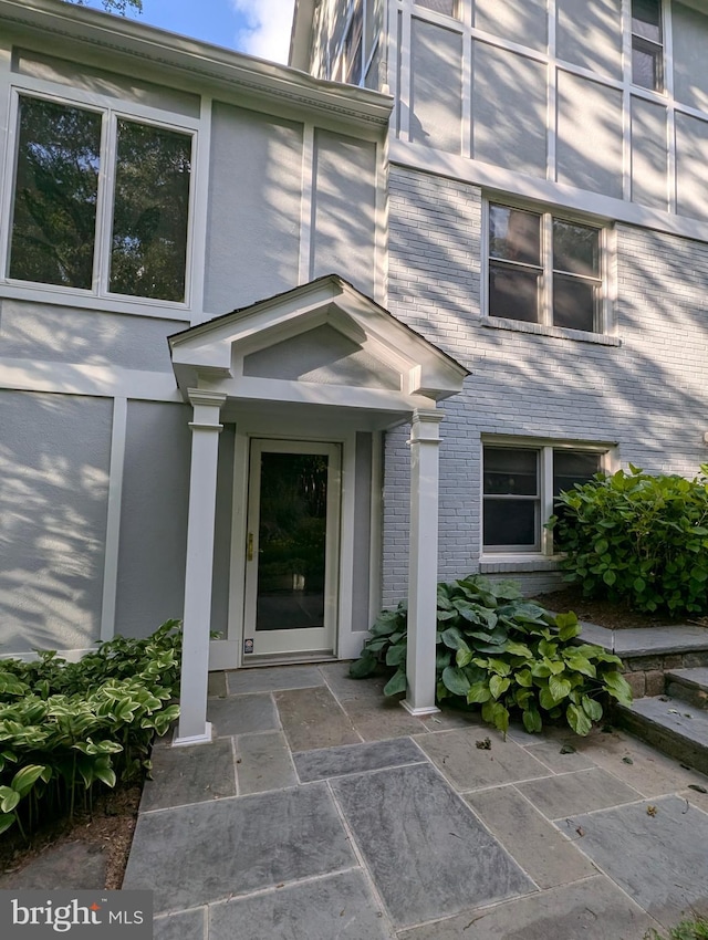 9510 Clement Rd, Silver Spring, MD 20910 - entrance to property featuring brick siding and a patio area