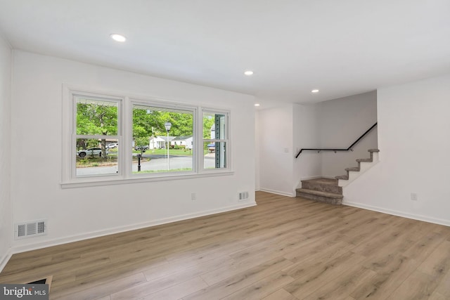 11 Rivercrest, Little Egg Harbor Twp, NJ 08087 - unfurnished living room with light wood finished floors, stairway, baseboards, and recessed lighting