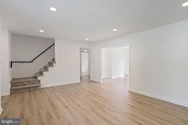 11 Rivercrest, Little Egg Harbor Twp, NJ 08087 - unfurnished living room with recessed lighting, stairway, light wood-type flooring, and baseboards