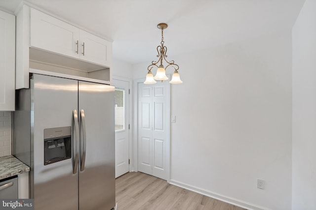 11 Rivercrest, Little Egg Harbor Twp, NJ 08087 - kitchen with stainless steel appliances, light wood finished floors, white cabinetry, pendant lighting, and backsplash