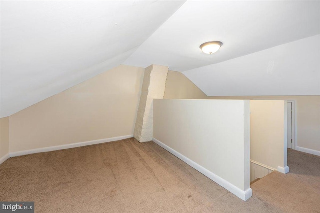 15 Degrange St, Frederick, MD 21701 - additional living space featuring carpet floors, vaulted ceiling, and baseboards