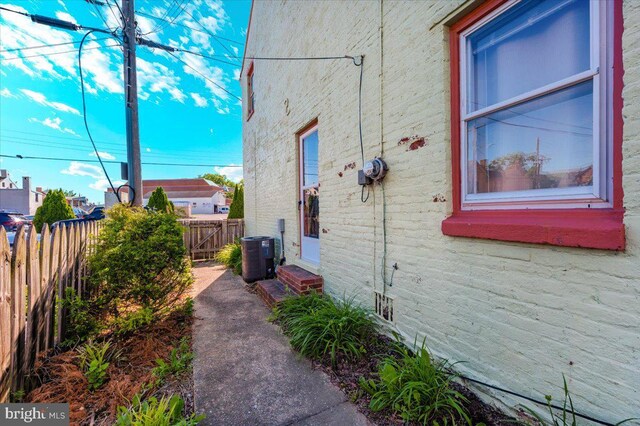 15 Degrange St, Frederick, MD 21701 - view of property exterior with entry steps and central air condition unit