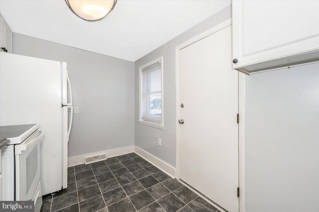 15 Degrange St, Frederick, MD 21701 - kitchen featuring white appliances, baseboards, and white cabinets