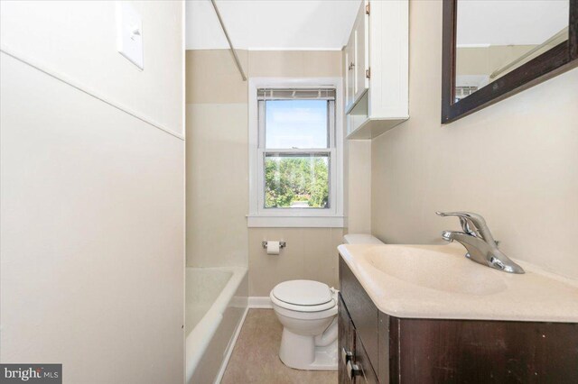 15 Degrange St, Frederick, MD 21701 - bathroom featuring toilet, vanity, a bathtub, baseboards, and a shower