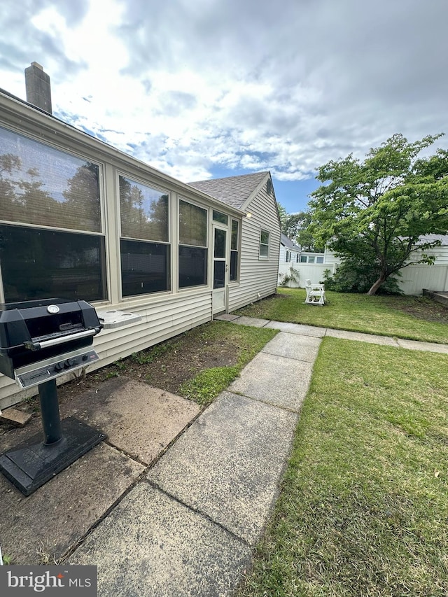 120 Lindsey Ave, Runnemede, NJ 08078 - view of side of property featuring a lawn and a shingled roof