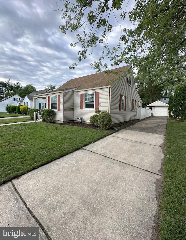 120 Lindsey Ave, Runnemede, NJ 08078 - ranch-style house with a front lawn, an outdoor structure, and a garage