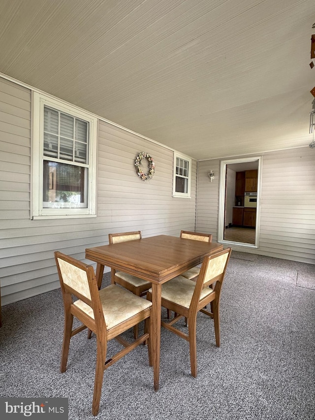 120 Lindsey Ave, Runnemede, NJ 08078 - dining space featuring carpet and wood walls