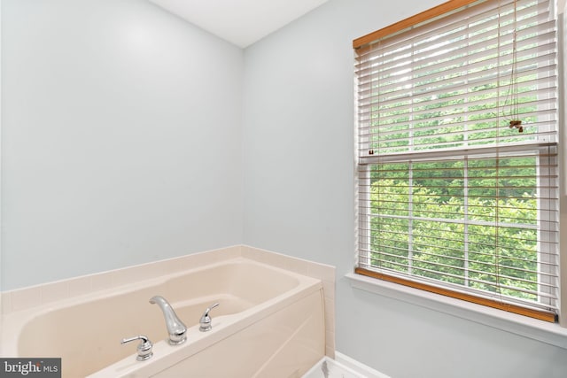 440 Glenn Rose Cir, King Of Prussia, PA 19406 - bathroom with a garden tub, plenty of natural light, and baseboards