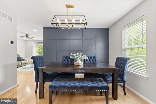 440 Glenn Rose Cir, King Of Prussia, PA 19406 - dining area featuring a chandelier, light wood-style flooring, baseboards, and a ceiling fan