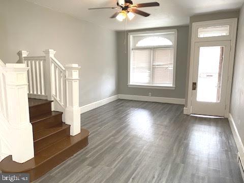 1364 Park Blvd, Camden, NJ 08103 - foyer entrance with baseboards, a ceiling fan, and dark wood-style flooring
