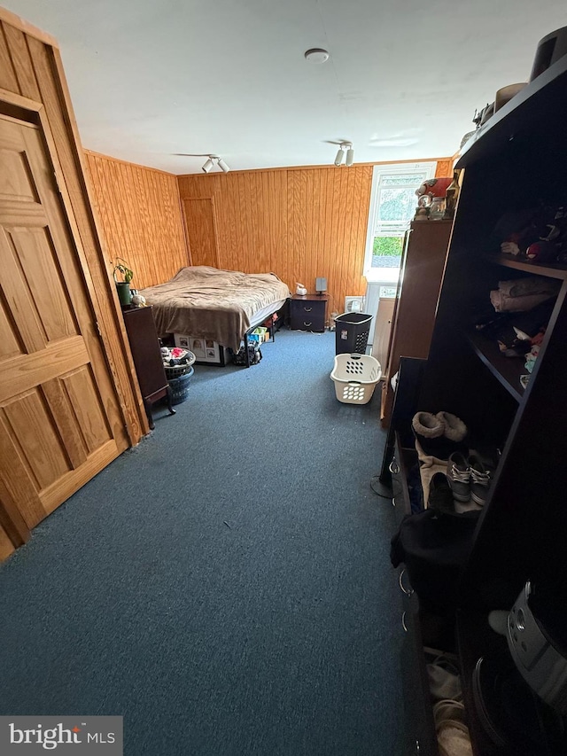 1243 Garry Ave, Vineland, NJ 08361 - bedroom featuring carpet and wooden walls
