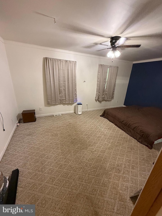 1243 Garry Ave, Vineland, NJ 08361 - unfurnished bedroom featuring carpet flooring, crown molding, baseboards, and a ceiling fan