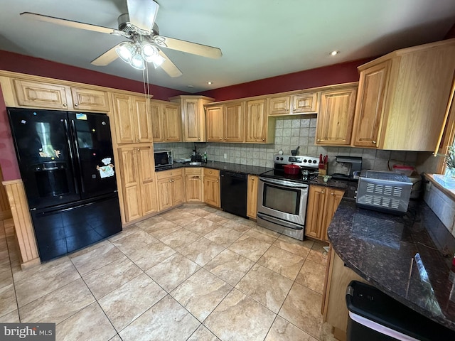1243 Garry Ave, Vineland, NJ 08361 - kitchen with black appliances, a ceiling fan, backsplash, dark stone counters, and light tile patterned floors