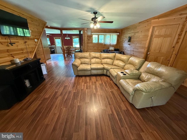 1243 Garry Ave, Vineland, NJ 08361 - living area featuring a ceiling fan, wood walls, and wood finished floors