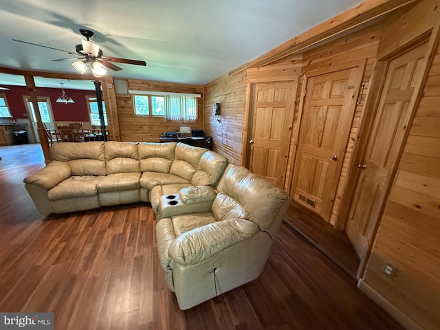 1243 Garry Ave, Vineland, NJ 08361 - living area featuring wood walls, ceiling fan, and wood finished floors
