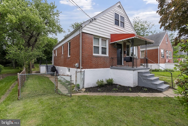 5421 Omaha Ave, Baltimore, MD 21206 - view of front of home with brick siding and a gate