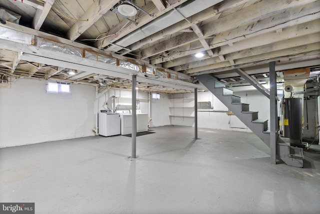 5421 Omaha Ave, Baltimore, MD 21206 - basement featuring washer and dryer, water heater, and stairs