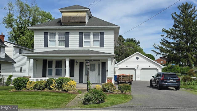 10913 Bower Ave, Hagerstown, MD 21740 - american foursquare style home with a detached garage, an outdoor structure, a porch, a front yard, and roof with shingles