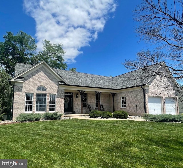 5810 Underwood Ct, Adamstown, MD 21710 - ranch-style house featuring brick siding, a front yard, covered porch, an attached garage, and roof with shingles