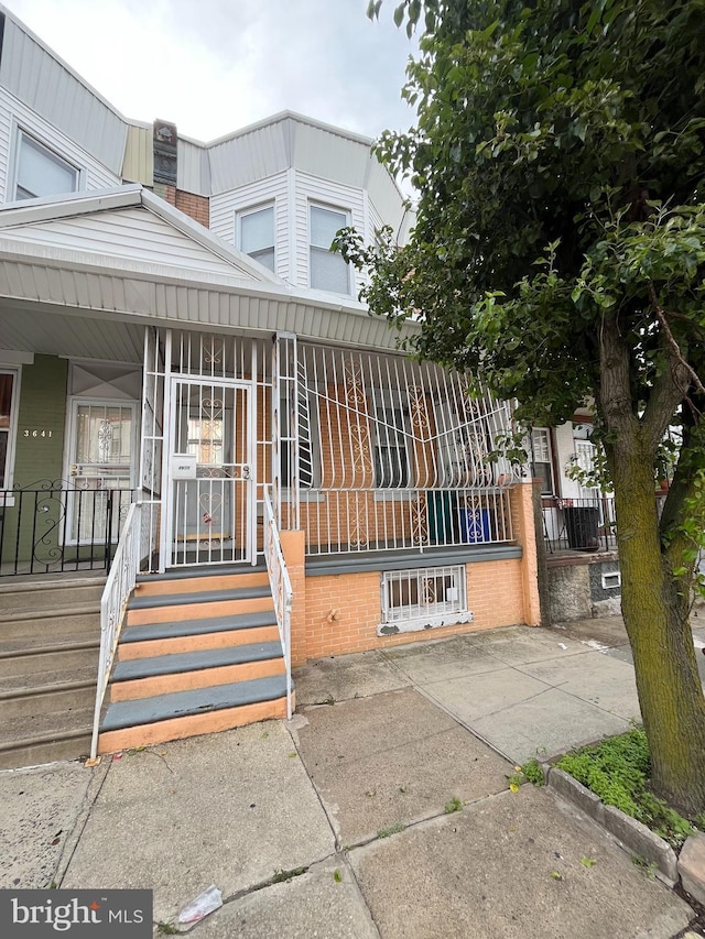 3639 N Darien St, Philadelphia, PA 19140 - view of front of property with brick siding and covered porch