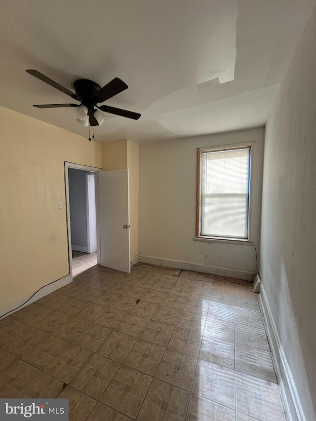 3639 N Darien St, Philadelphia, PA 19140 - spare room featuring a ceiling fan and baseboards