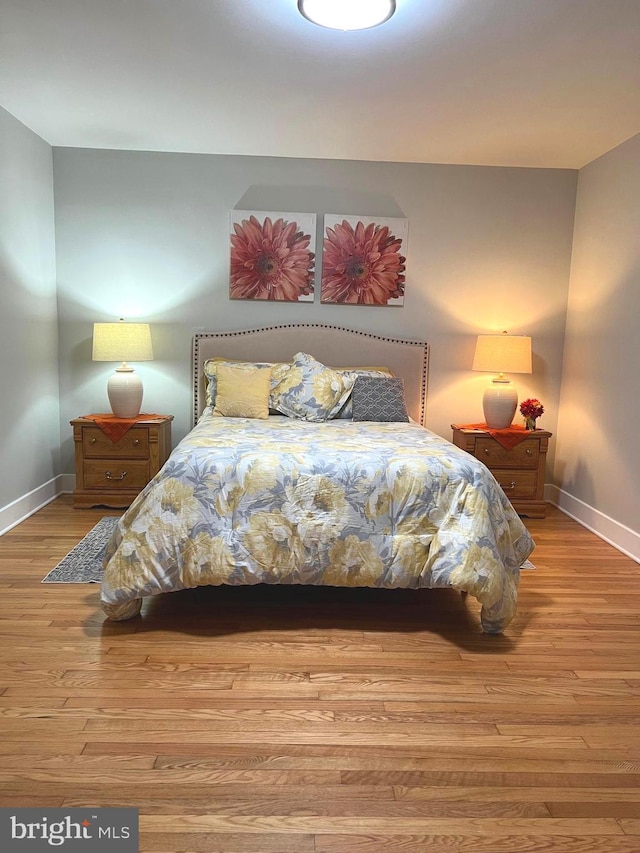 3701 Lochearn Dr, Gwynn Oak, MD 21207 - bedroom featuring baseboards and wood finished floors