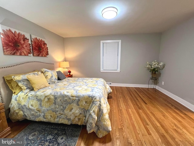 3701 Lochearn Dr, Gwynn Oak, MD 21207 - bedroom featuring wood finished floors and baseboards