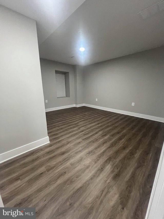 3701 Lochearn Dr, Gwynn Oak, MD 21207 - spare room with dark wood-style floors and baseboards