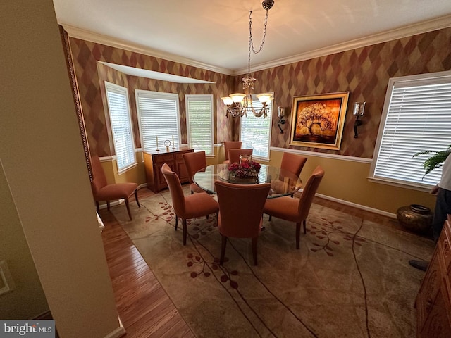 5054 Valley Stream Ln, Macungie, PA 18062 - dining area featuring baseboards, crown molding, a chandelier, wood finished floors, and plenty of natural light